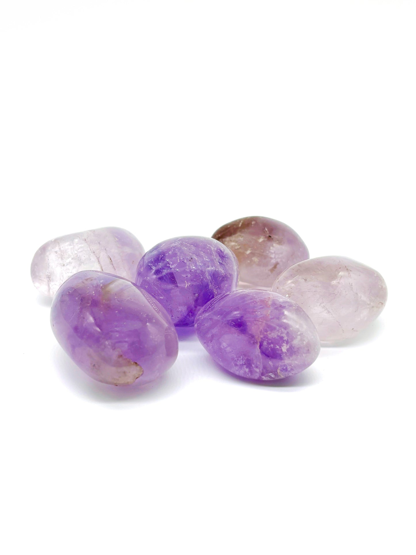 Ametrin kristall – kombination av ametist och citrin som stärker kreativitet, balans och andlig klarhet