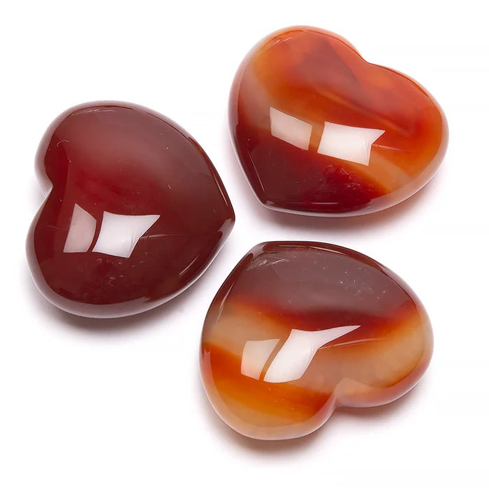 Karneol hjärta i slipad kristall – vacker andlig sten för energi, värme och balans, perfekt att hålla i handen