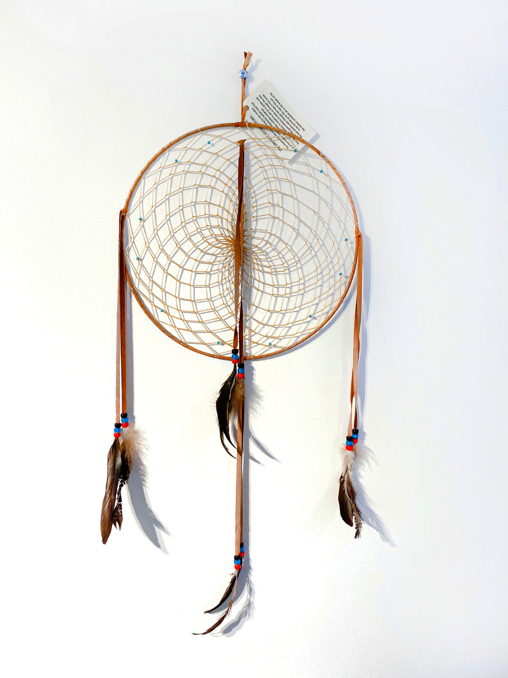 Rödbrun drömfångare 30 cm handgjord av Navajoindianer i New Mexico