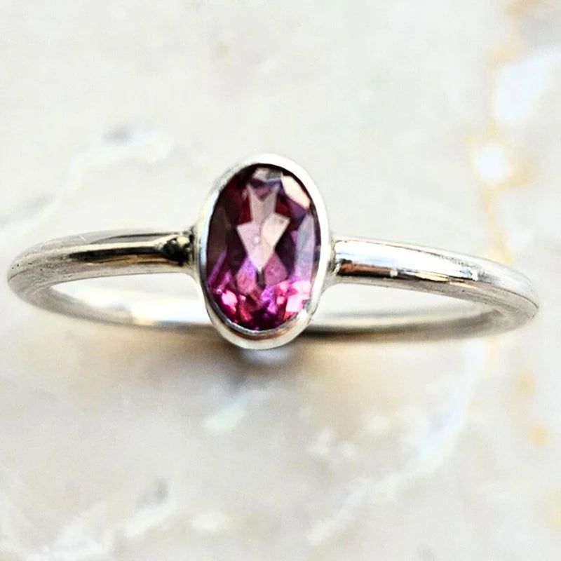 Silverring i 925 sterling silver med rosa fasettslipad topas